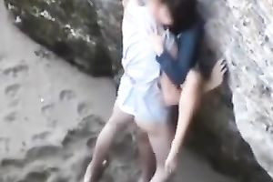 This doxy is definitely having a great time with her BF on the beach