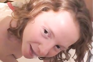 Curly haired blonde wench takes penis in her throat and receives jizzed in