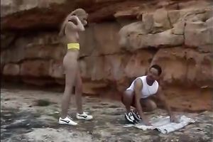 Cute non-professional golden-haired receives drilled on a beach after giving a oral-sex