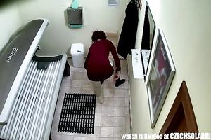 Busty redhead legal age teenager tans her astounding body in solarium