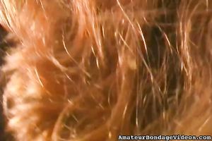 Chubby redhead bitch rides a sybian and receives her booty spanked