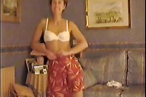 Skinny older blondie strips on web camera exposing her body