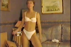 Skinny older blondie strips on web camera exposing her body