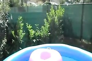 My charming golden-haired milf slutty wife gives me irrumation in the inflatable pool