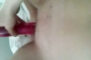 I simply love playing with my red sex-toy when I am truly bored