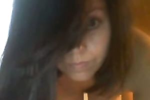 Sexy dark-haired ex fuckbuddy shows her scoops and body for the web camera