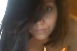 Sexy dark-haired ex fuckbuddy shows her scoops and body for the web camera