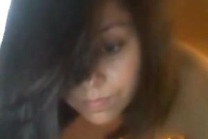 Sexy dark-haired ex fuckbuddy shows her scoops and body for the web camera