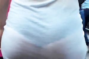 This honey proudly displays her worthy a-hole and cleavage in see-through costume