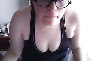Horny woman in glasses rubs her thick cookie for me