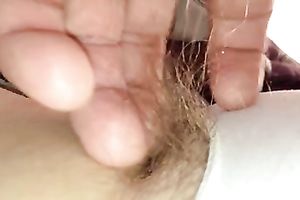 I just love playing with her lengthy pubic hair throughout her pantie and rub her snatch