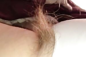 I just love playing with her lengthy pubic hair throughout her pantie and rub her snatch