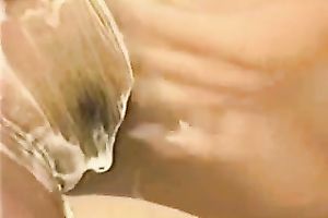 Beautiful and large boobed brunette hair shaves her snatch