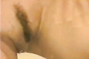 Beautiful and large boobed brunette hair shaves her snatch