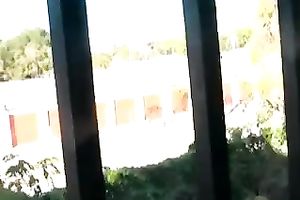 My sexy and cute ebon girlfriend giving me head on the balcony