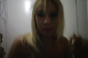 Homemade episode with cute dilettante blonde stripping in front of web camera