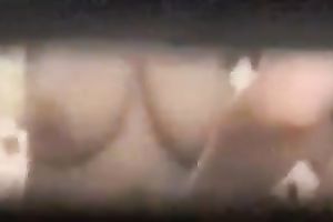 Watching the neighboring floozy receives undressed and exposing her zeppelins and her booty