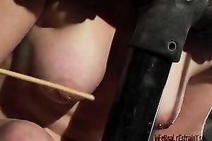 Hogtied golden-haired bondservant with a hook in her gazoo is suspended and punished