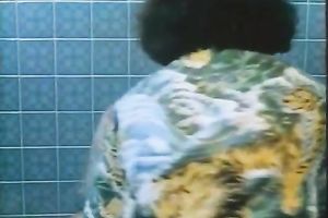 That golden-haired delicious cougar lets that brunette hair tease her in the shower