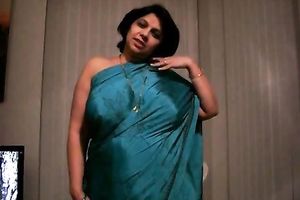 Mature Indian slut shows off her large milk shakes and a-hole