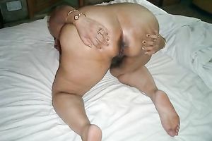 Mature Indian slut shows off her large milk shakes and a-hole