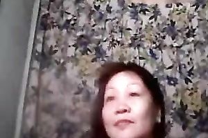 Mature Asian slutty wife acquires wicked in front of a webcam