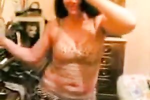 Sensual brunette hair woman dances sexily in homemade solo video