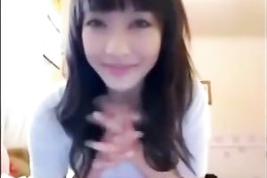 Gorgeous and perverted Asian sweetheart reaming her pussy with sex toy