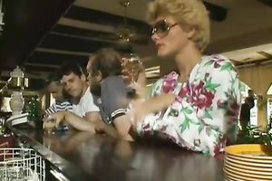 Big boobed blondie meets a man at the bar and takes him home