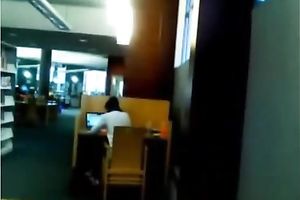 Curvy dark brown sweetie flashes her cunny in the public library