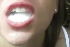 Nasty golden-haired hottie outdoors is engulfing weenie and playing with cum