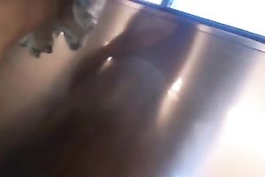 Secretly taking an upskirt movie of bootyful honey on escalator