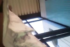 Secretly taking an upskirt movie of bootyful honey on escalator