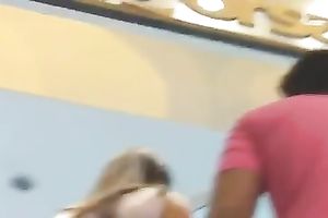 Up petticoat of gorgeous girl with boyfriend on the streets