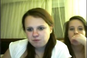 Two nerdy brown-haired legal age teenagers finger wet cracks in cam show