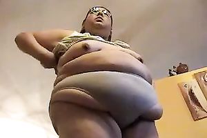 Enormous SSBBW brunette hair older hotwife puts on her pants and brassiere