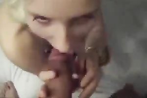Titless golden-haired sucks her lover's shaft with excitement