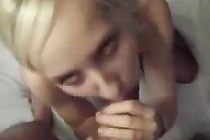 Titless golden-haired sucks her lover's shaft with excitement