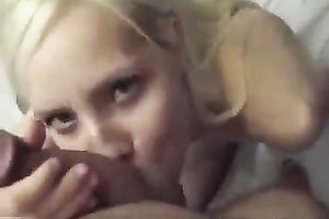 Titless golden-haired sucks her lover's shaft with excitement