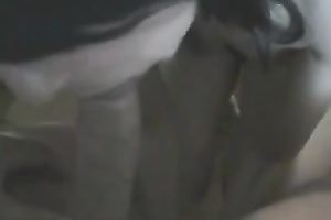 Black haired wifey sucks her hubby's meat stick like a champ on camera