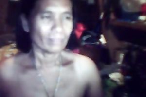 Ugly slim Filipina mama shows her flaccid meatballs for the webcam