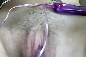 I tickle my love tunnel with my vibrating sex toy until I cum