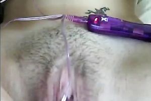 I tickle my love tunnel with my vibrating sex toy until I cum