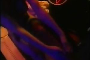 Brown-haired cutie demonstrates her boobs for the webcam in a club