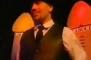 Brown-haired cutie demonstrates her boobs for the webcam in a club