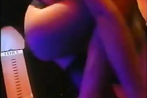 Brown-haired cutie demonstrates her boobs for the webcam in a club