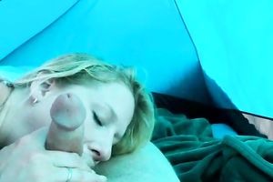 This nasty gal is having the fucking of a lifetime in a tent