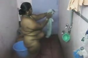 Fat Indian BBC slut washes her body in the baths in hidden webcam clip