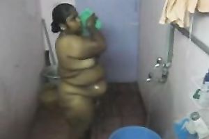 Fat Indian BBC slut washes her body in the baths in hidden webcam clip
