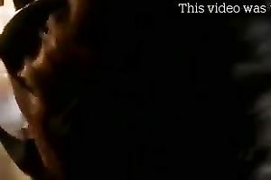 Sexy dark brown wench gives skillful fellatio to her guy